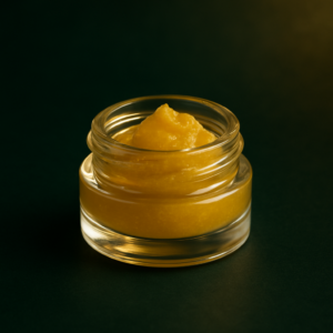 AI : a small jar of golden cannabis live rosin…